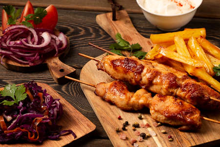 Arabic traditional cuisine, Shish tawk with potatoes and red cabbage salad, homemade, no people ,. High quality photoの写真素材