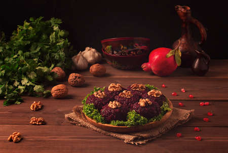 Traditional Georgian dish beetroot phali on a wooden table horizontal, no people,. high quality photoの写真素材