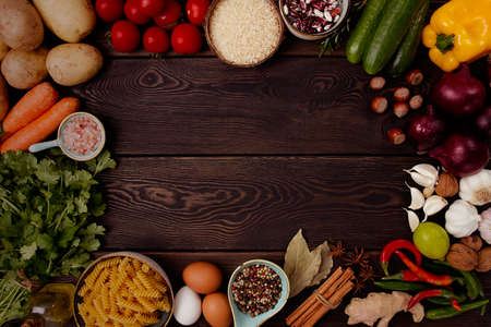 Assortment of ingredients and spices , for cooking, on a wooden background, concept, top view, food background, horizontal, no people, tonedの写真素材