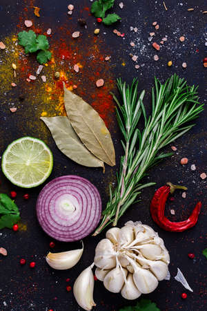 Food background set of spices and herbs, on a dark background, concept, top view, no people,