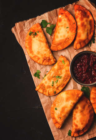 Fried mini pasties, with red sauce, top view, close-up, no people, selective focus,の写真素材