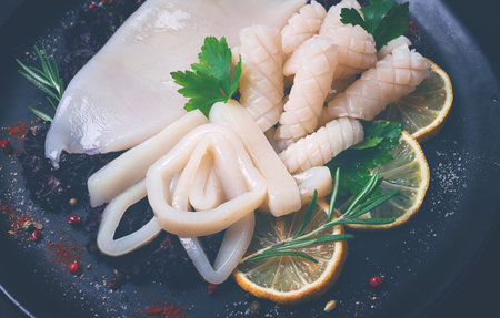 Fresh squid, raw, carcass, cut into rings, top view, no people,の写真素材