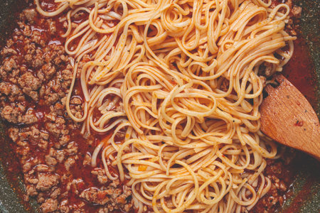 Spaghetti Bolognese, top view, in a frying pan, close-up, without people, homemade,の写真素材