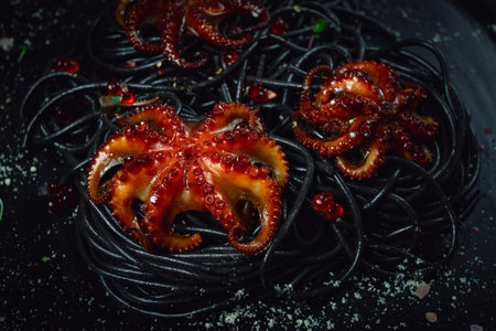 black spaghetti with baby octopuses, homemade, no people,の写真素材