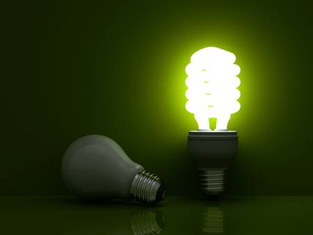 It s time for energy saving light bulb, Glowing compact fluorescent light bulb standing near unlit...