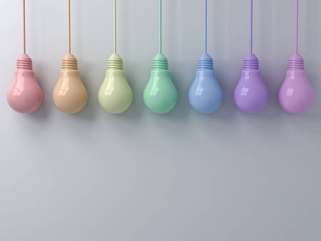 Colorful hanging light bulbs on white wall background. 3D rendering.の写真素材