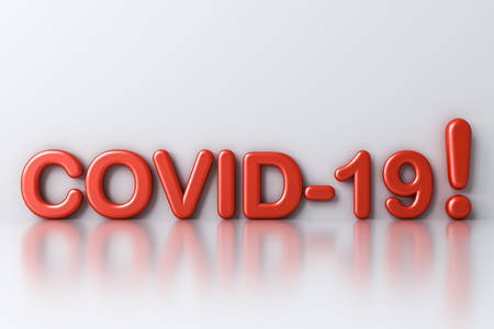 Covid-19 with exclamation mark warning text isolated on white room background with shadow and...