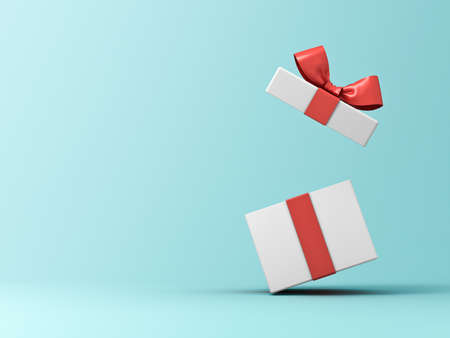 Front view of open present box or gift box with red ribbons and bow isolated on green blue pastel...