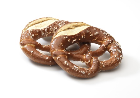 traditional german bread bretzel  isolated on a white backgroundの写真素材