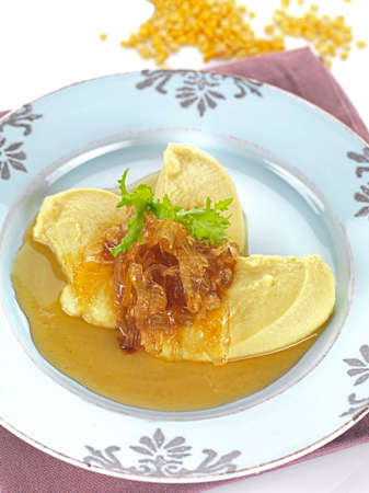 A traditional greek plate named fava served in a modern way.It is made of mashed boiled fava...