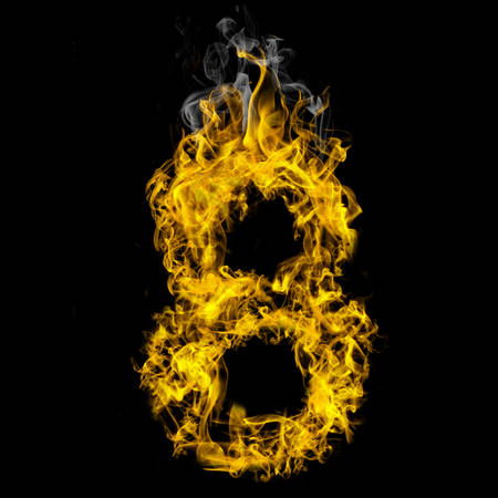 Number eight on fire on black backgroundの写真素材