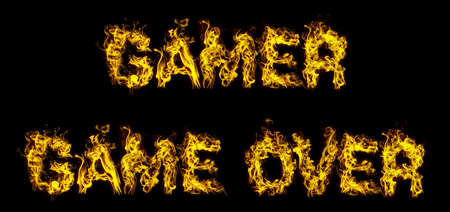 Fiery words GAMER and GAME OVER on black background. 3d renderingの写真素材
