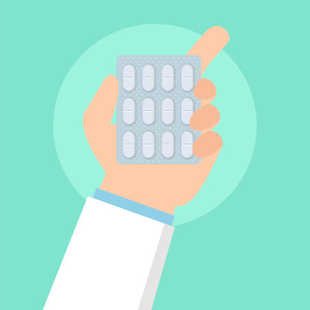 Hand holding a blister pack of pills. Flat design vector illustration.のイラスト素材