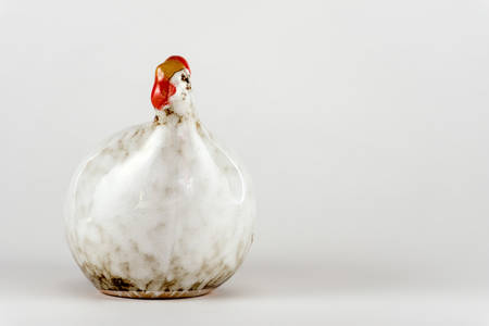 Porcelain figurine in the form of chicken. Souvenir.の写真素材