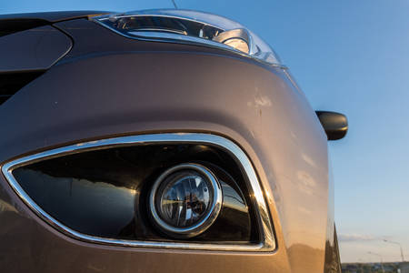 Modern passenger car is on the road