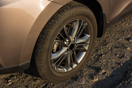 Modern passenger car is on the roadの写真素材