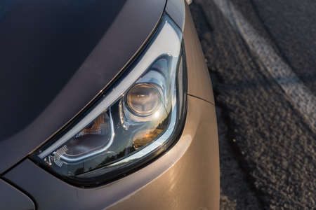 Modern passenger car is on the roadの写真素材