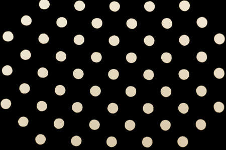 Black colander on a white background closeupの写真素材