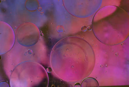 abstract background of velvet violet or light purple colors of oil floating on water
