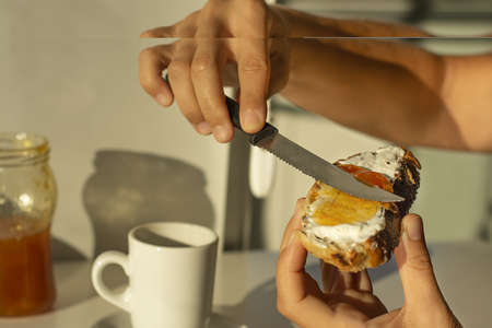 Healthy breakfast with toasted bread, coffee and jamの写真素材