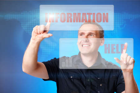 Man using holographic interface, pressing white and red buttons with words information and help