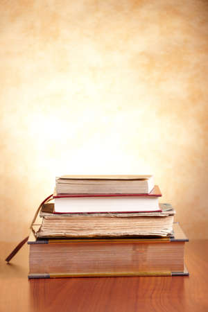 Old books on the wooden tableの写真素材