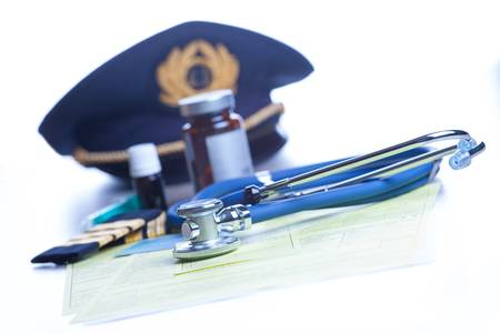 Close up of an airplane pilot equipment hat and epaluetes with doctorの写真素材