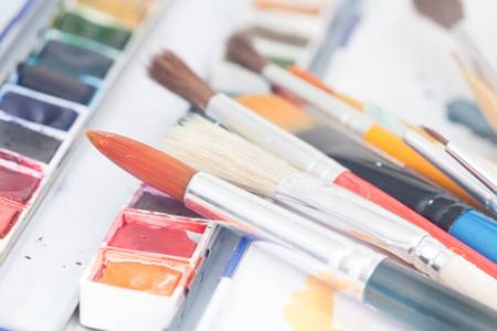 Professional watercolor paints with artistic brushesの写真素材