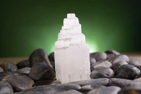 Selenite natural crystal mineral gypsum known as satin spar, desert rose, and gypsum flower の写真素材