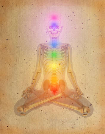 Chakras illustrated over human body with visible skeleton on old parchmentの写真素材