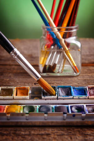 Professional watercolor paints with artistic brushesの写真素材