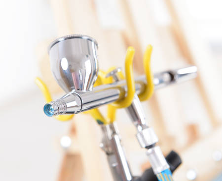 Professional airbrush on a stand, visible needleの写真素材