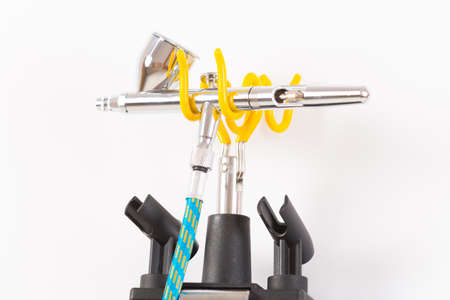 Professional airbrush on a standの写真素材