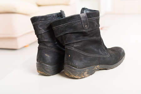 Worn dirty black woman's shoesの写真素材