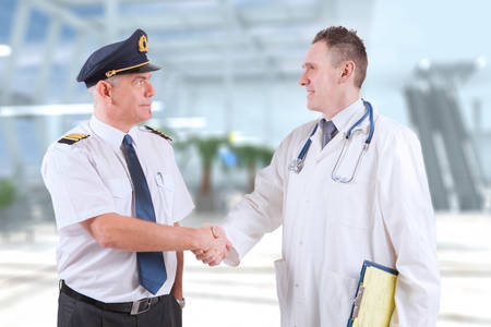 Commercial airplane pilot with doctor