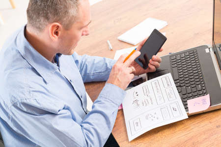 Designer working at new mobile applications