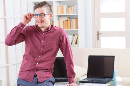 Designer or programmer working at home with new mobile applications