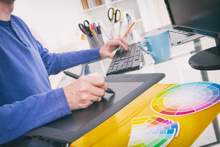 Designer using graphics tablet in the officeの写真素材