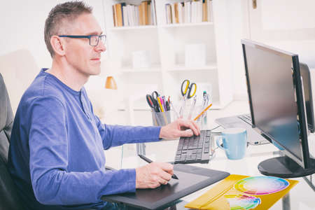 Designer using graphics tablet in the office