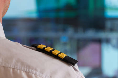 Close up of captain's epaulettes in the cockipt of commercial airplaneの写真素材