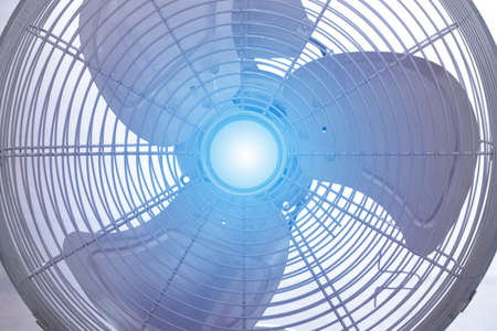 Metal ventilation fan on floor