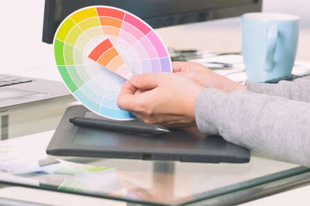 Designer using graphics tablet in the officeの写真素材