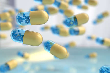 Falling capsules with a drug with nicely blurred background; 3d illustration conceptの写真素材