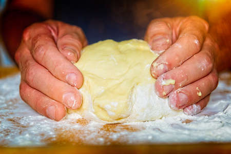 Preparing dough for noodles, dumplings. Dough made from wheat flour.