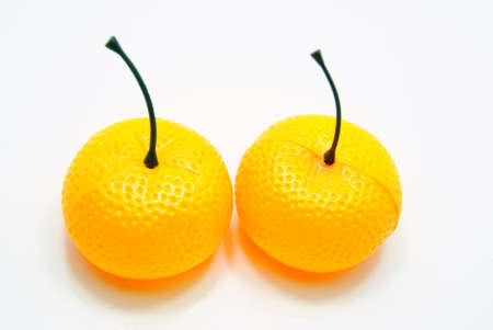 a fake orange isolated on white backgroundの写真素材