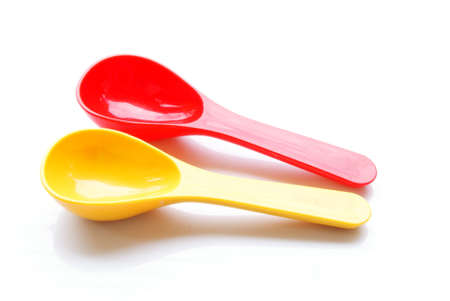 Plastic spoons isolated on white backgroundの写真素材