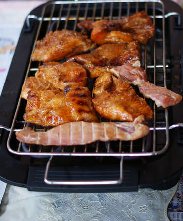 stakes grilling on the barbequeの写真素材