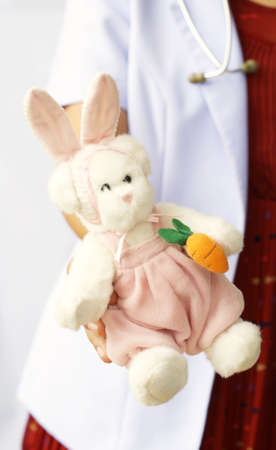 doctor offering the dollの写真素材
