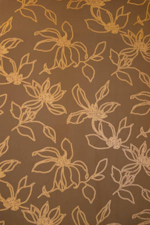 An exotic brown color floral pattern weaved fabric as textural background の写真素材