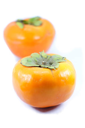 persimmon isolated on white backgroundの写真素材